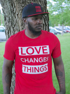 Love Changes Things UNISEX Signature Tee - Red